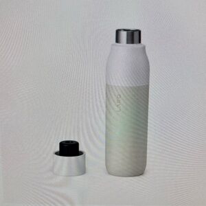 Elegant White Insulated Bottle with Silver Accents